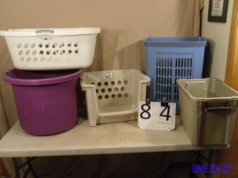Assorted storage containers and laundry baske...