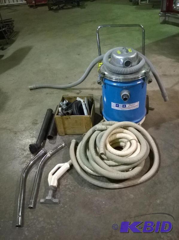 lot 199 image: Acme Electric Vacuum with Assorted Hoses & Attachments, powers on
