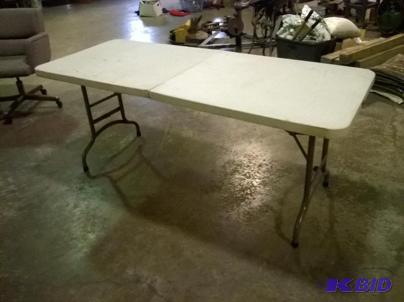 lot 22 image: Suitcase Folding Table 29.5in x 72in x 29in