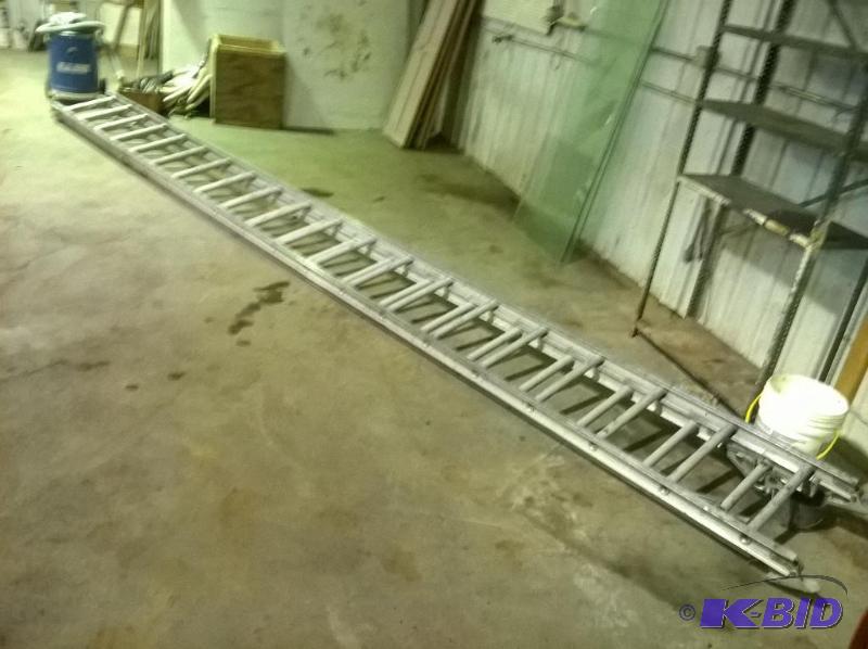 lot 32 image: 32ft Aluminum Extension Ladder, 24ft collapsed