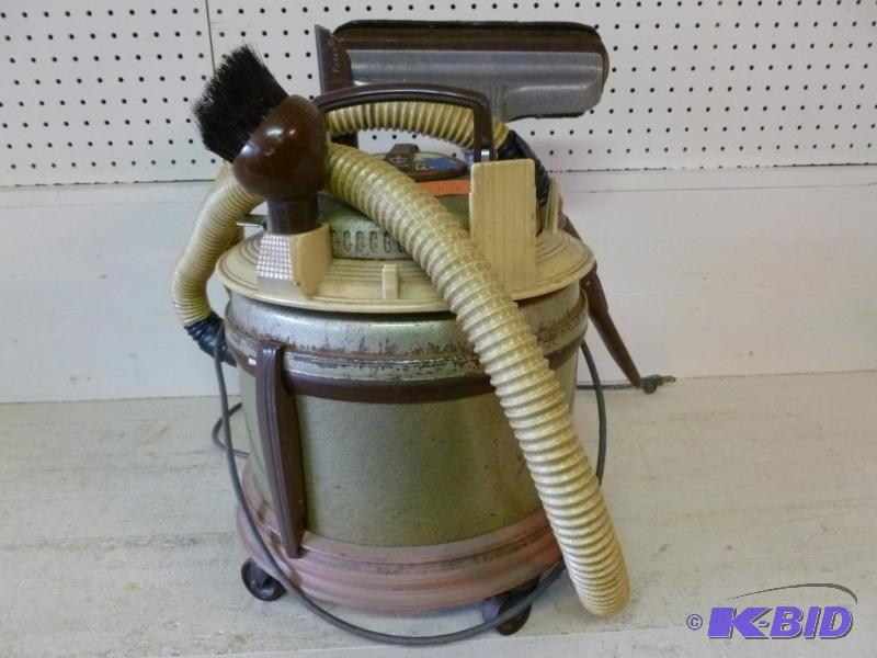 lot 13 image: Filter Queen canister vacuum with attachments...