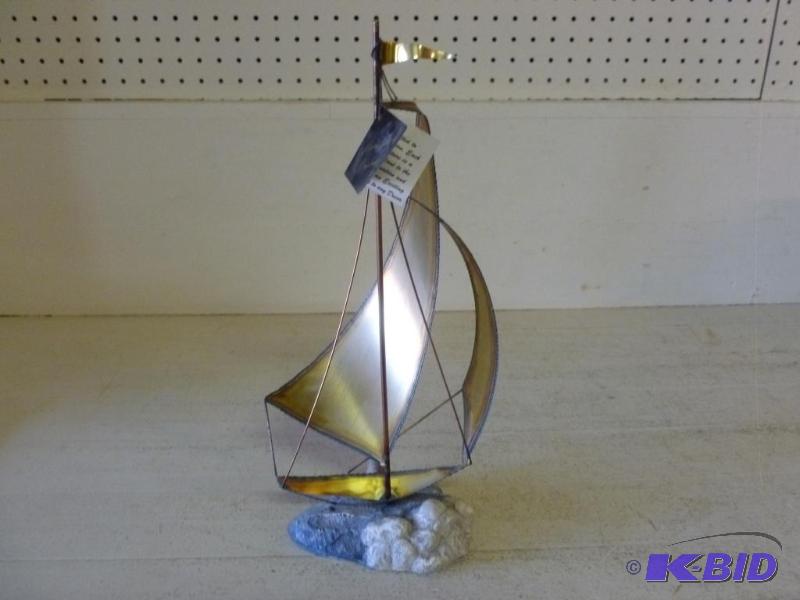 lot 132 image: Nice Mario Jason Originals cut brass sail boa...