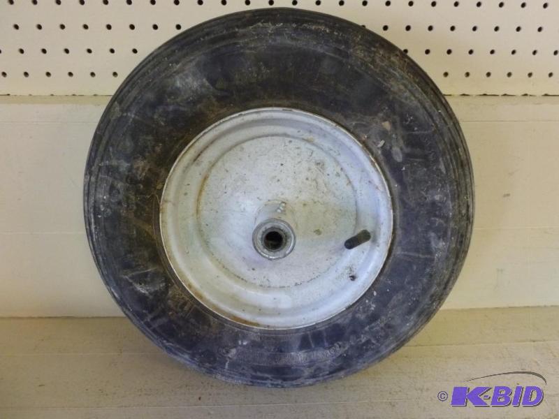 lot 137 image: Blackstone rim mounted wheel barrow tire size...
