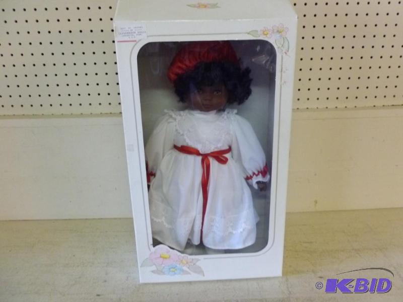 lot 143 image: Large Lloyderson&nbspdoll that measures abou...