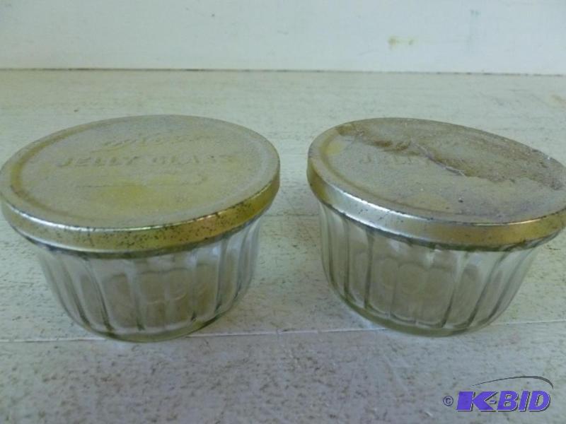 lot 32 image: Lot of two vintage Kerr glass jelly jars with...
