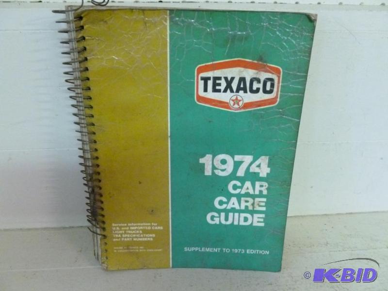 lot 65 image: Vintage 1974 Texaco car care guide metal spir...
