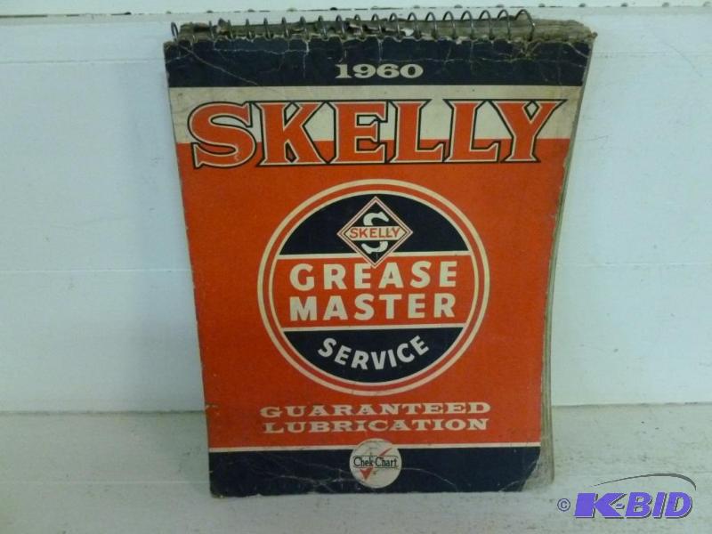 lot 66 image: Vintage 1960 Skelly car care guide metal spir...