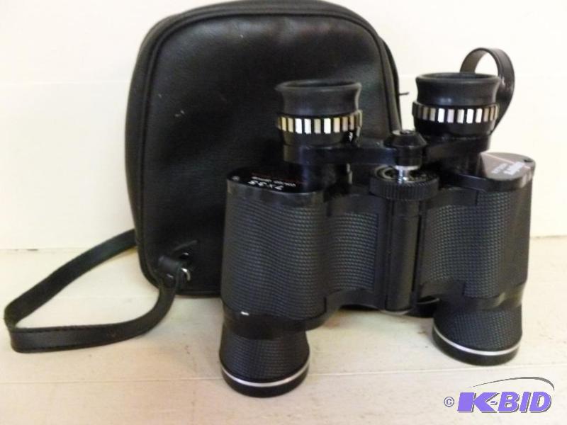 lot 76 image: A pair of Empire 7 x 35 binoculars model 218,...