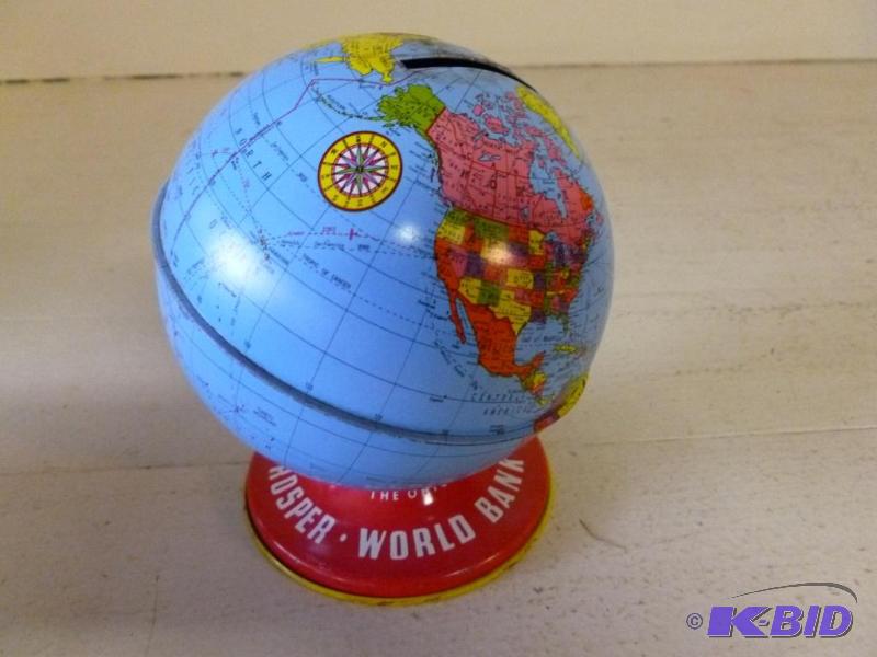 lot 77 image: Vintage Ohio Art all metal world coin bank 5&...