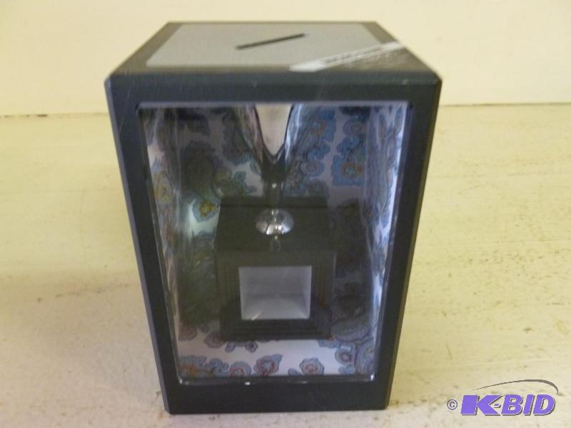 lot 78 image: Gold Crest Magic Micro Coin Bank - looks like...