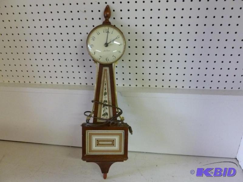 lot 86 image: Vintage Seth Thomas wood encased electric wal...