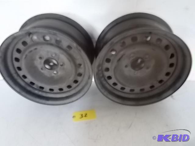lot 32 image: (2) 2002 Crown Victoria Rims, 5 Bolt...