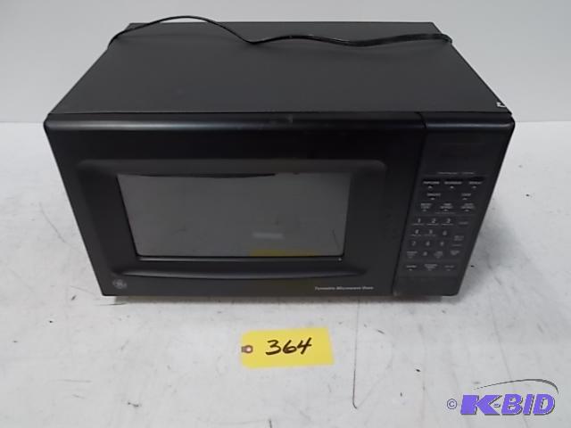 lot 364 image: G.E. Microwave Oven...