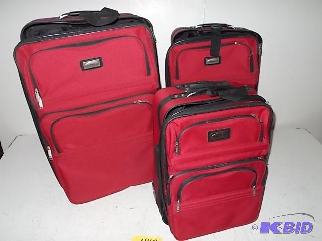 lot 447 image: (3) pc. Nesting Suit Cases...