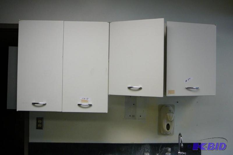 lot 107 image: Upper wall metal cabinets 66&quotL x 30"...