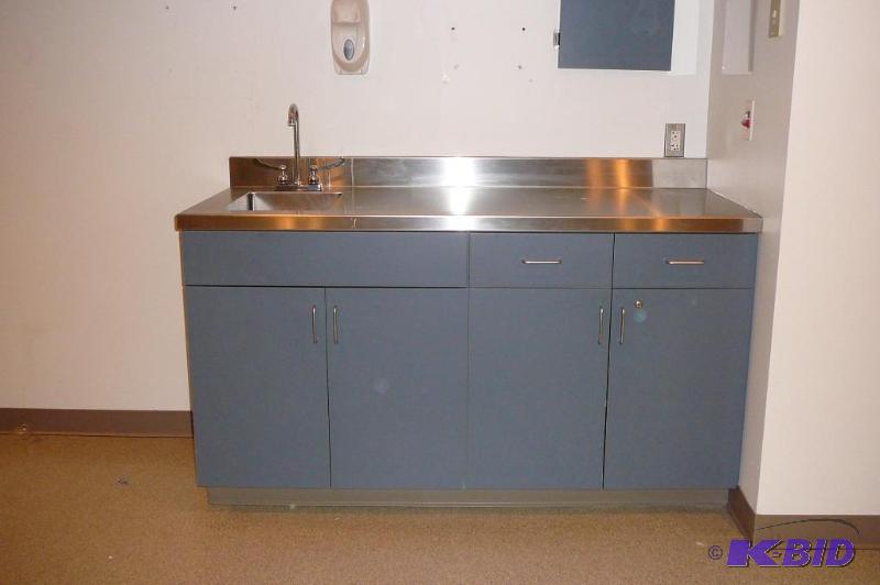 lot 145 image: Base cabinet with stainless steel counter top...