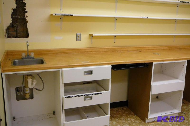 lot 17 image: Lower storage unit with counter top and built...