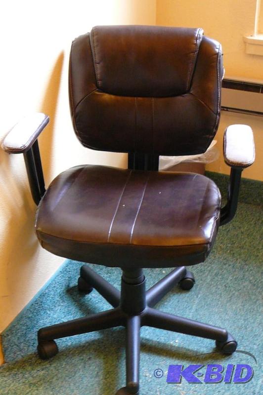 lot 54 image: Leather office chair on casters ...