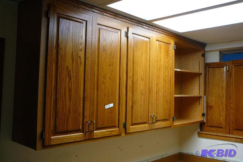 lot 209 image: Upper oak cabinets with shelves one unit 97-1...
