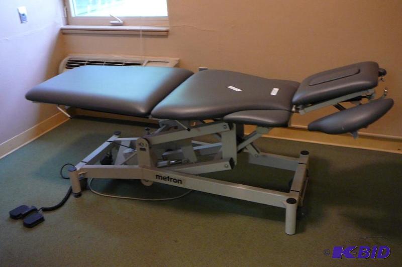lot 242 image: Metron&nbspadjustable message table with ele...