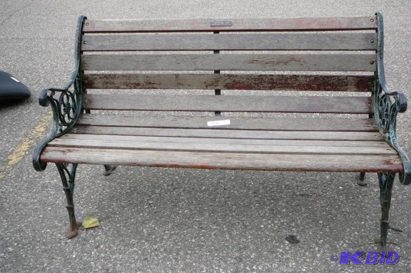 lot 331 image: Oak and cast iron bench ...