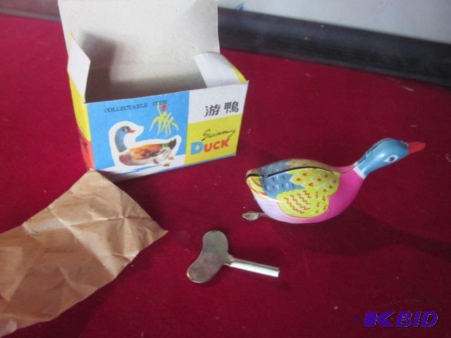 lot 113 image: Vintage 1960s tin litho toy duck with box an...