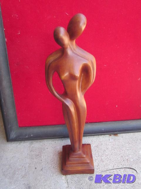 lot 132 image: 16 inch faux wood resin statue. ...