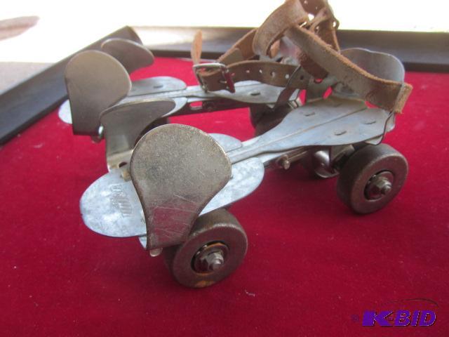 lot 142 image: Pair of Union metal roller skates with leathe...