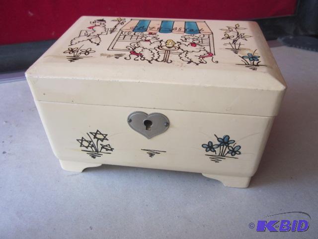 lot 26 image: Vintage white enameled poodle Japan music jew...