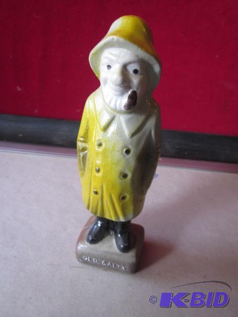 lot 27 image: Old Salty plastic salt shaker, 6 inches tall....