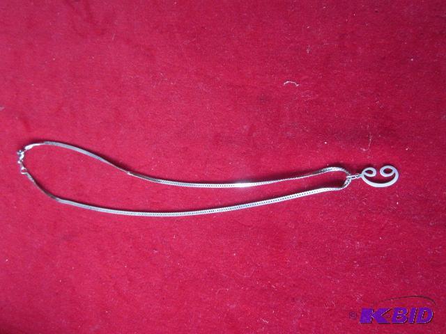lot 3 image: Sterling necklace with pendant, marked .925....
