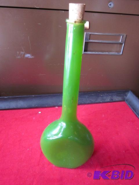 lot 45 image: Green glass bottle with cork stopper, no chip...