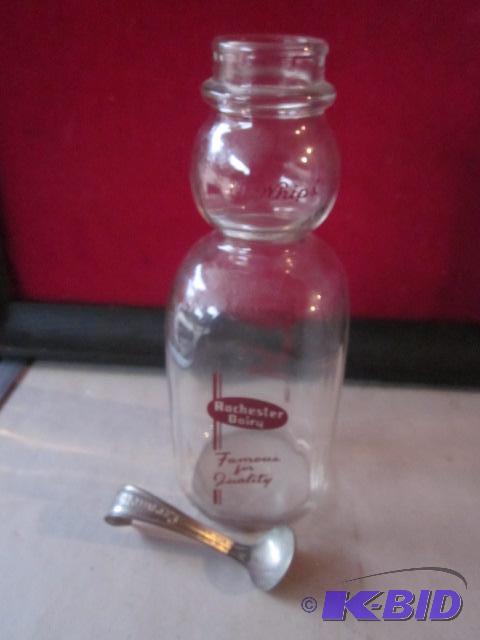 lot 65 image: Vintage Rochester Milk bottle with creamer sp...