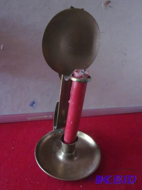 lot 80 image: Vintage brass adjustable candle holder....