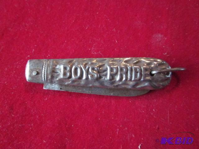 lot 99 image: Early 1900s Dixon German Boys Pride pocket k...
