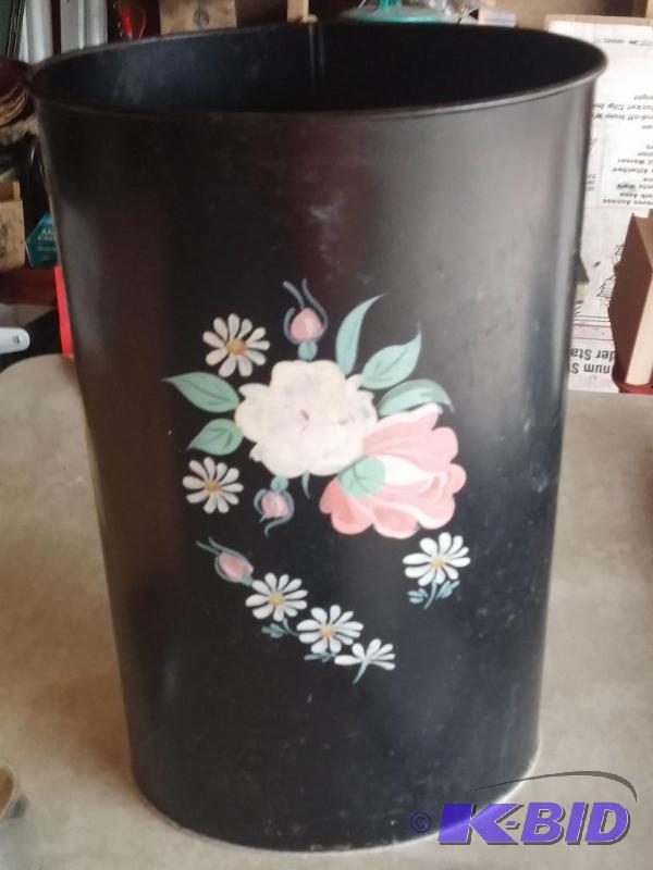 Tall vintage metal garbage can