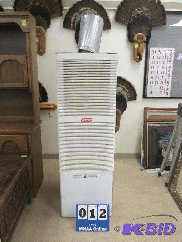 lot 12 image: Upright 62,000 BTU Gas Coleman Heater