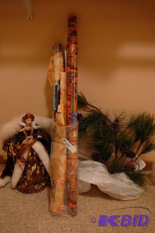 Christmas figurines, wrapping paper and wall ...