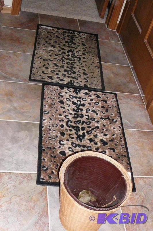 2 leopard print rugs and wicker plant pot...