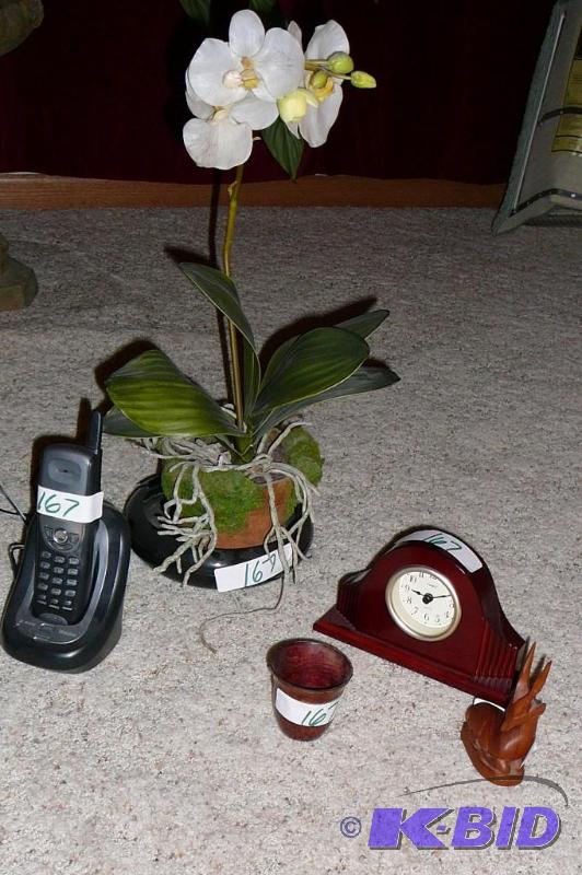 Clock ,telephone, plant and a deer figurine&n...