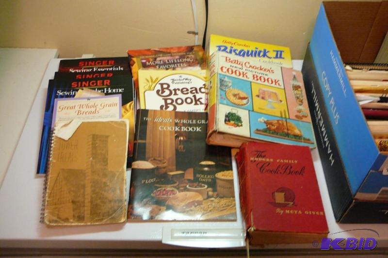 Large lot of cook book, sewing books and ect....