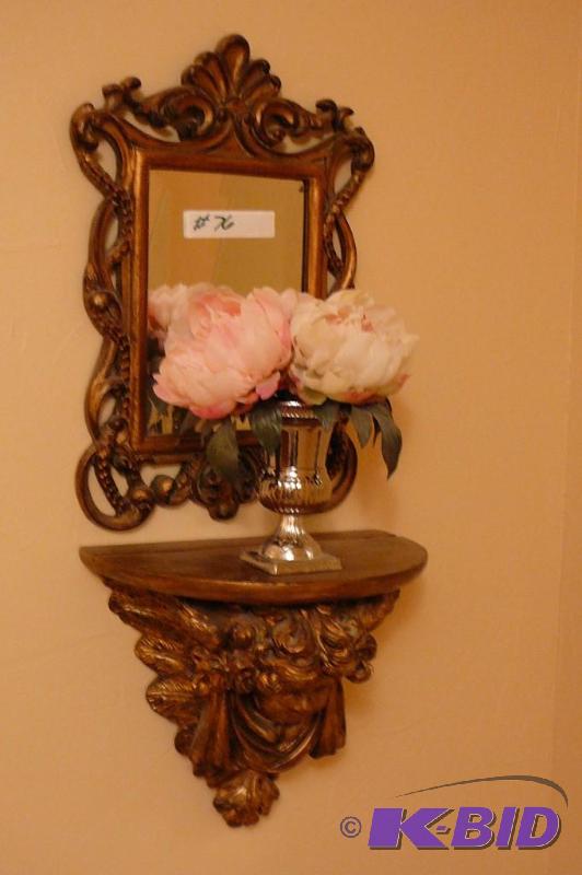 Decorative mirror with shelf flowers and vase...
