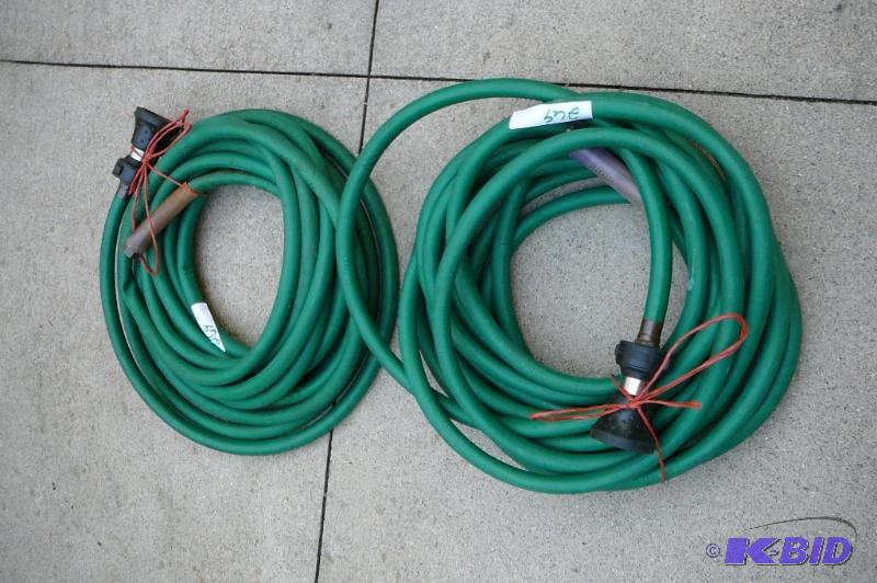 lot 269 image: 2 garden hoses with spray nozzles&nbspon end...