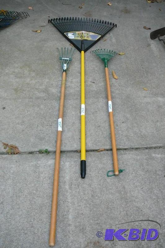lot 282 image: Tuff rake and 2 broom rakes ...