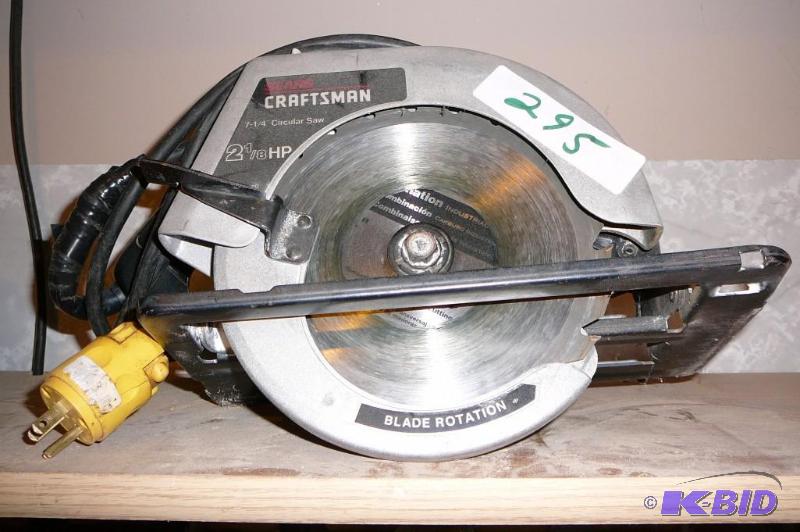 lot 295 image: Sears craftsman 2-18 HP circular saw...