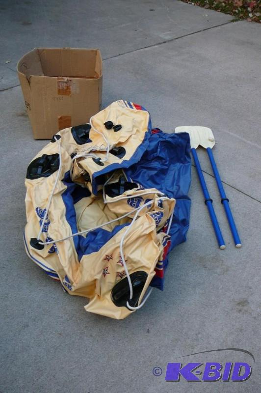 lot 374 image: 4 person blow up boat with paddles boat has n...
