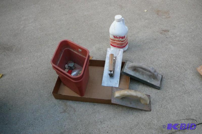 lot 391 image: Trawls, flower pots and bottle of Tile Pro...