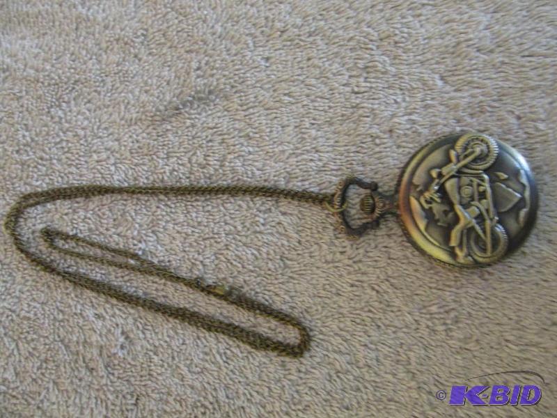 lot 85 image: Bronze Colored Motorcycle Pocket Watch.