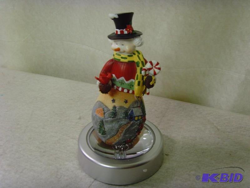 lot 100 image: Snowman With Cardinal Figure