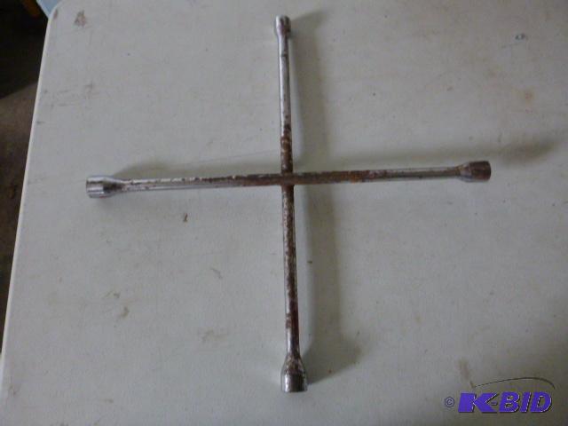 lot 100 image: 4-Way Tire Wrench...